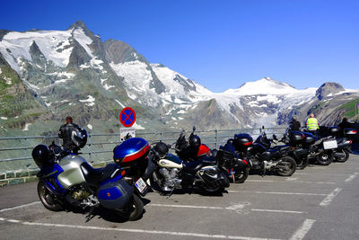 Bicycles parked against mountain range