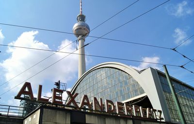 Alexanderplatz. low angle view against the sky., and the television tower in the backgroung.
