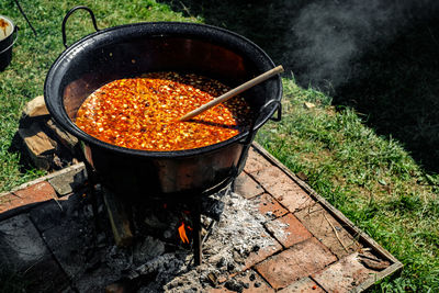 Traditional hungarian goulash soup in the cauldron