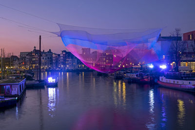 City scenic from amsterdam in the netherlands in christmas time at the river amstel