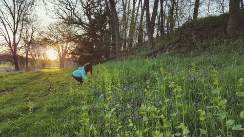 Full length of man standing on grassy field