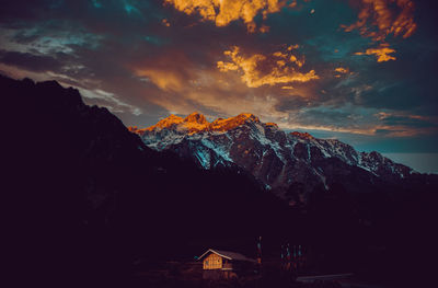 Scenic view of mountains against sky during sunset