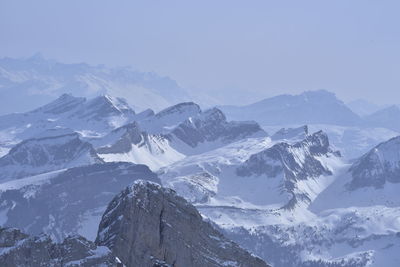 Scenic view of snowcapped mountains against sky