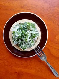 High angle view of salad in bowl on table