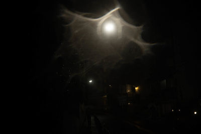 Illuminated street lights at night