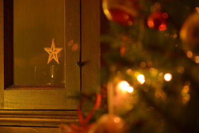 Illuminated christmas tree at night