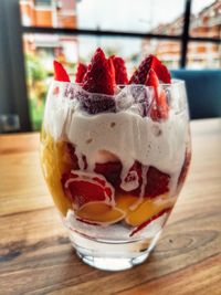 Close-up of ice cream in glass on table