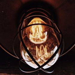 Close-up of illuminated light bulb