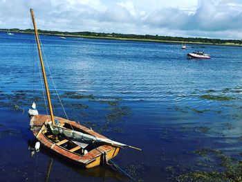 Boats moored in sea