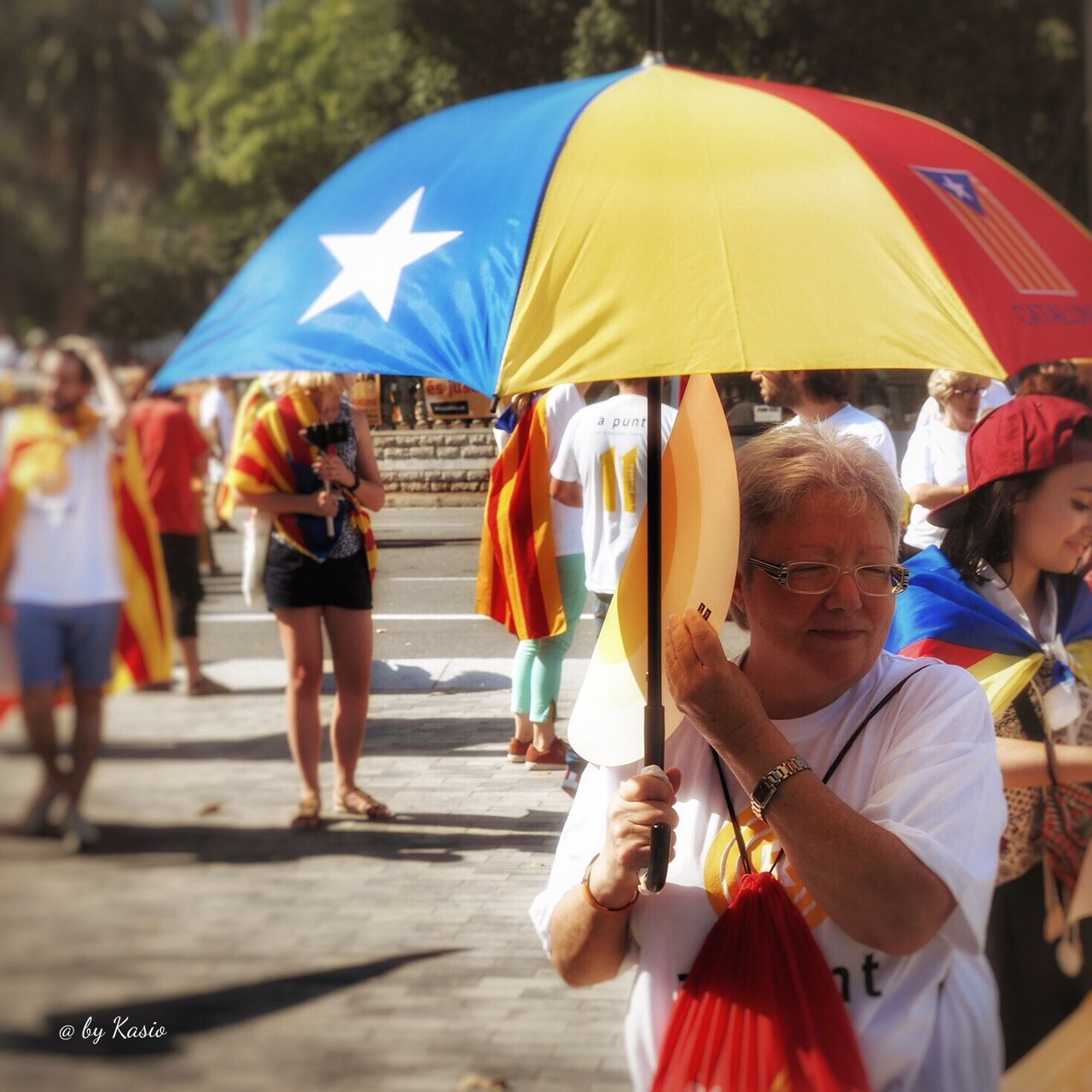 leisure activity, lifestyles, childhood, casual clothing, umbrella, parasol, holding, day, outdoors, fun, person, amusement park