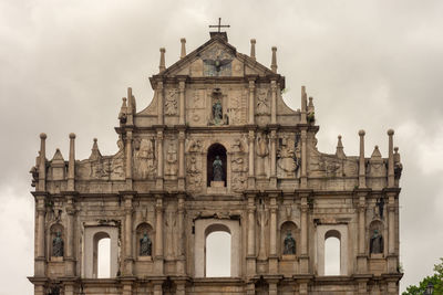 Low angle view of historic building against sky