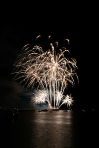 Firework display at night