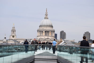 Tourists in front of building