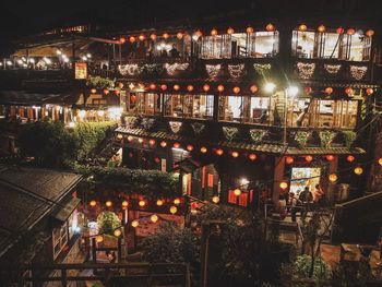 High angle view of illuminated buildings at night