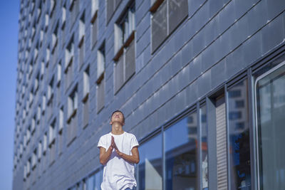 Man against building