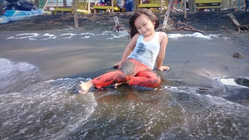 Cute girl enjoying in water