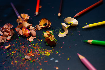 High angle view of multi colored pencils on table