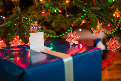 Close-up of illuminated christmas tree at night