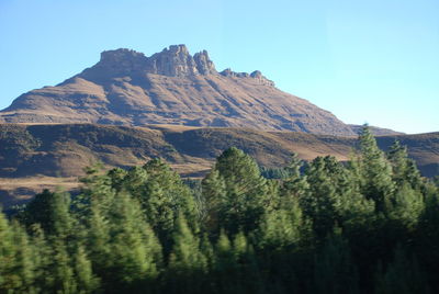 Scenic view of rocky mountains against clear sky