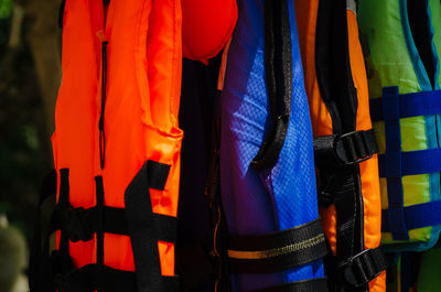 Close-up of multi colored umbrellas hanging on clothesline