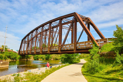 Bridge over river against sky