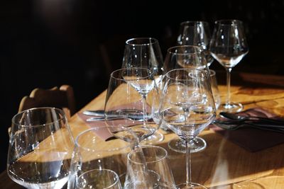 Wineglasses arranged on table at restaurant