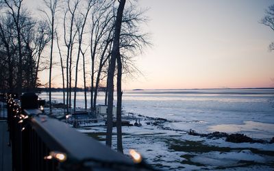 Scenic view of sea against sky at sunset