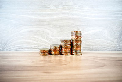 Stack of coins on table