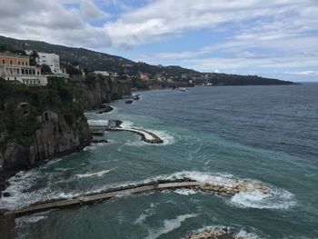 Scenic view of sea against cloudy sky