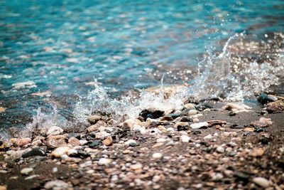 Close-up of stones on beach