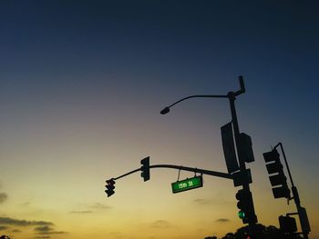 Low angle view of street light against sky