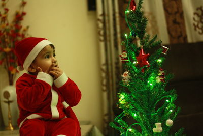 Full length of christmas tree at home