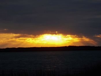 Scenic view of sunset over sea