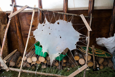 High angle view of clothes hanging on wood