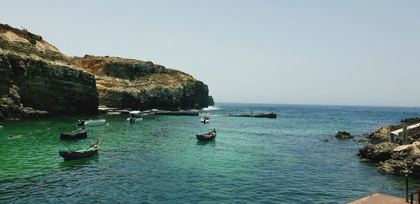 Scenic view of sea against clear sky