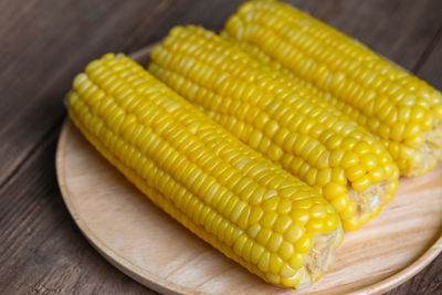 Close-up of corn on table