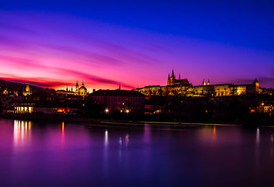 Illuminated buildings at waterfront