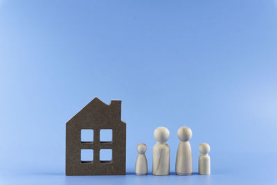 Close-up of toys against blue background