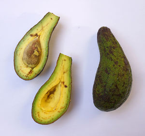 High angle view of fruits against white background