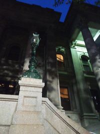 Low angle view of illuminated building at night