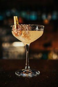 Close-up of beer glass on table