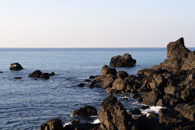 Scenic view of sea against clear sky