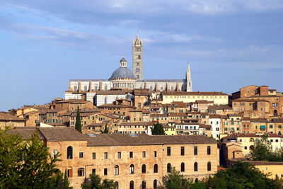 The view on the city with ancient buildings. siena, italy.