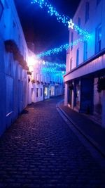 Illuminated street light at night