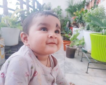Portrait of cute boy looking away