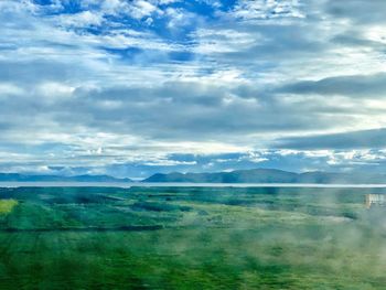 Scenic view of land against sky