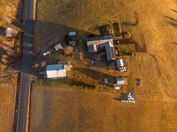 High angle view of buildings on field