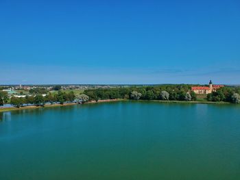 Scenic view of sea against clear blue sky