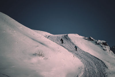 Scenic view of snowcapped mountain against sky