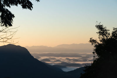 A foggy pastel sunrise over the mountains in the serra dos Órgãos national park, teresópolis, brazil